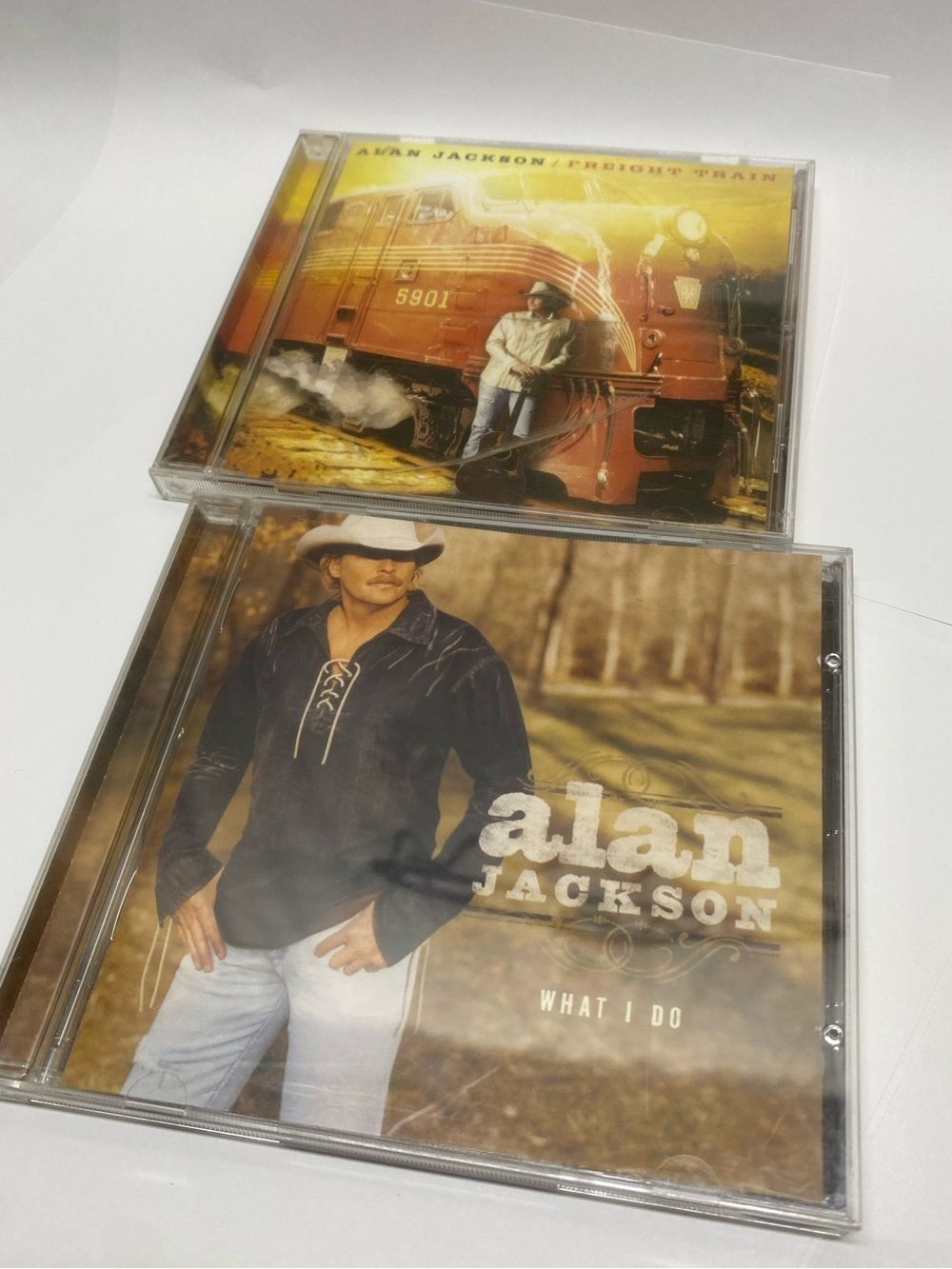 Alan Jackson  2 country music CD what I do & freight train